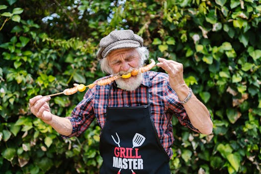 Senior man enjoying grilled shrimp skewers at a barbecue, wearing a 'Grill Master' apron